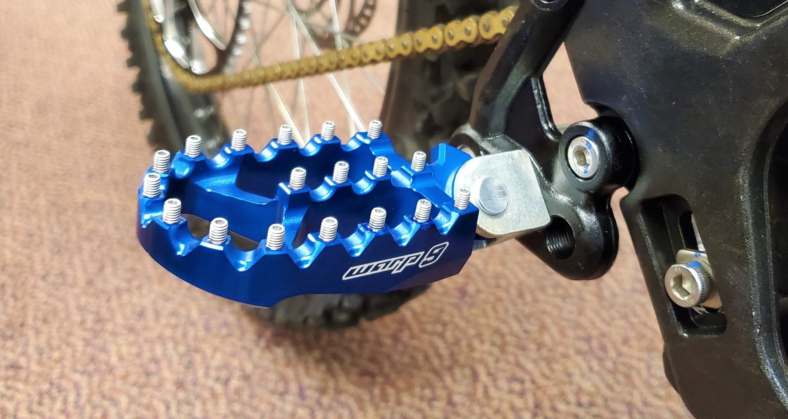 Warp 9 Foot Pegs for Surron Light Bee and E Ride Pro